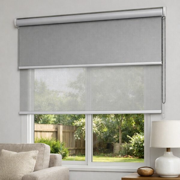 Double roller blinds in Newcastle NSW featuring a light filtering sunscreen layer and blockout blind for flexible privacy and light control by Plantation Shutters.